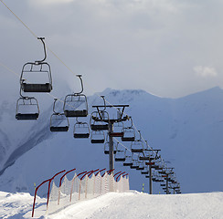 Image showing Snow skiing piste and ropeway