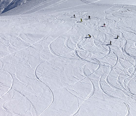 Image showing Snowboarder downhill on off piste slope