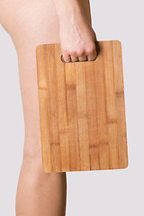 Image showing girl holding chopping board