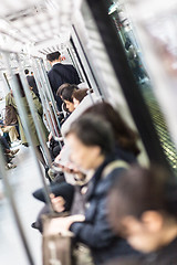 Image showing Passengers traveling by Tokyo metro.