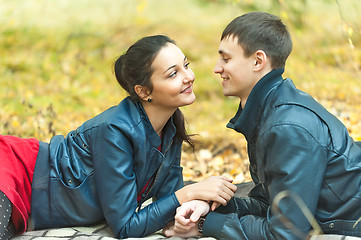 Image showing Young romantic happy couple on autumn picnic