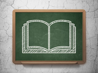 Image showing Learning concept: Book on chalkboard background