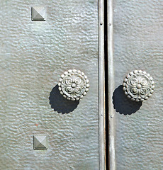 Image showing  varese    knocker in a  door curch  closed  italy  sumirago