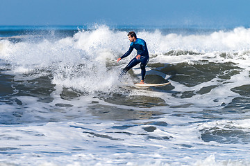 Image showing Surfing the waves