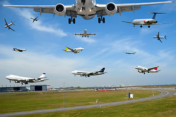 Image showing Air travel - Plane traffic in airport at rush hour