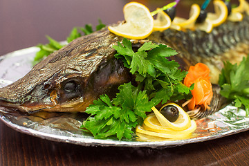 Image showing sturgeon baked with greens 