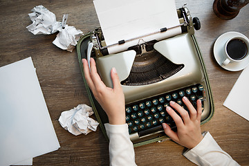 Image showing Vintage typewriter and white paper