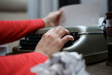 Image showing woman working on typewriter