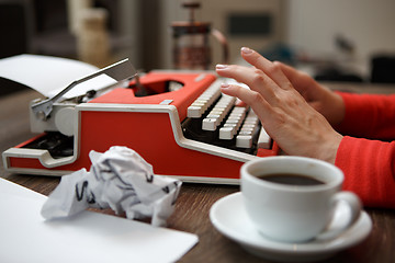 Image showing Side view of typewriter on desk