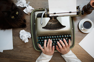 Image showing Vintage typewriter and white paper