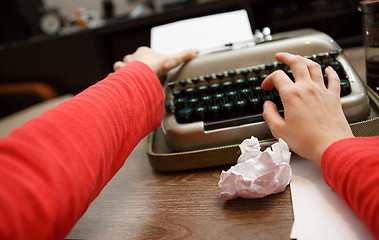 Image showing woman working on typewriter