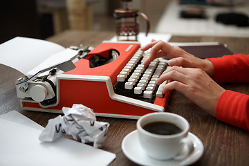 Image showing Side view of typewriter on desk