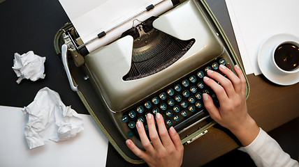 Image showing Vintage typewriter and white paper