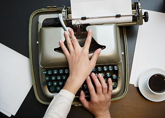 Image showing closeup of coffee and hands writing