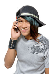 Image showing Asian punker calling by cell phone