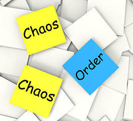Image showing Chaos Order Post-It Notes Show Disorganized Or Ordered