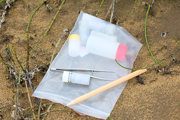 Image showing Monitoring the environment: taking samples for analysis