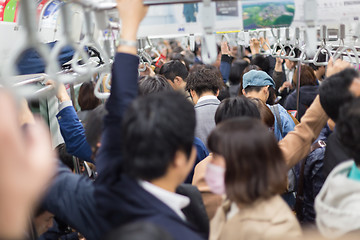 Image showing Passengers traveling by Tokyo metro.