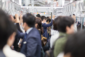 Image showing Passengers traveling by Tokyo metro.