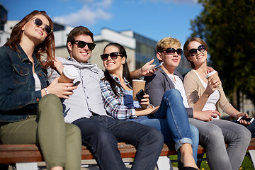 Image showing group of students or teenagers drinking coffee