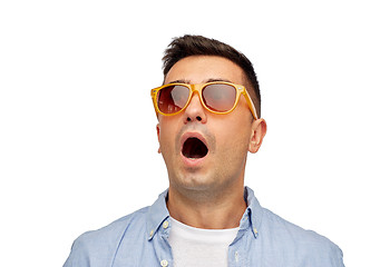 Image showing face of scared man in shirt and sunglasses