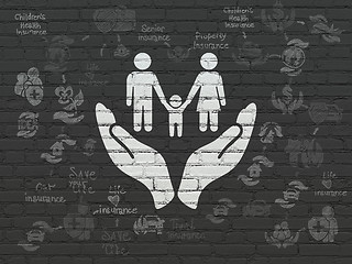 Image showing Insurance concept: Family And Palm on wall background