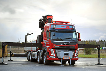 Image showing Red Volvo FM Truck equipped with Heavy Crane