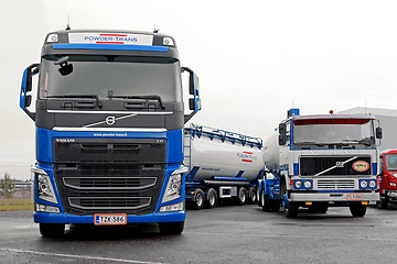 Image showing  Two Volvo Tank Trucks New and Retro