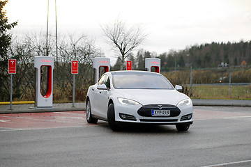 Image showing Tesla Model S Electric Car Leaves Supercharger Station