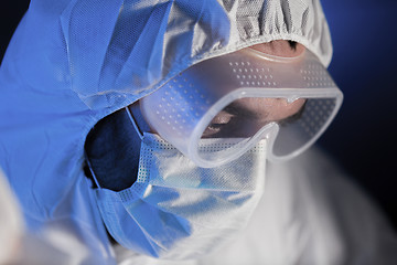 Image showing close up of scientist face in chemical lab