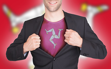 Image showing Businessman opening suit to reveal shirt with flag