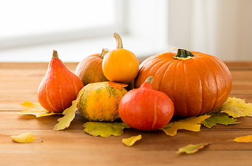 Image showing close up of pumpkins on wooden table at home