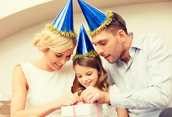 Image showing happy family with gift box