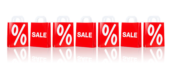 Image showing many red shopping bags with sale and percentage