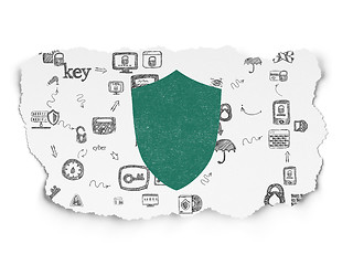 Image showing Security concept: Shield on Torn Paper background