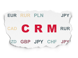 Image showing Business concept: CRM on Torn Paper background