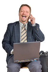 Image showing Laughing businessman gets good news