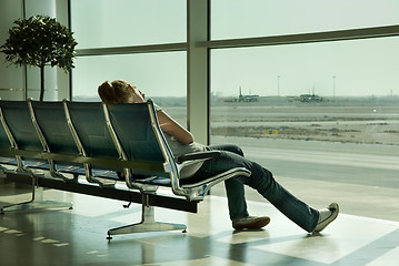 Image showing Lonely girl waiting in airport