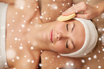 Image showing close up of woman having face massage in spa salon