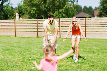 Image showing happy family playing outdoors