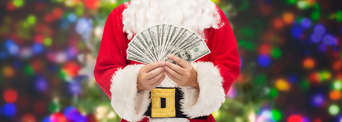 Image showing close up of santa claus with dollar money