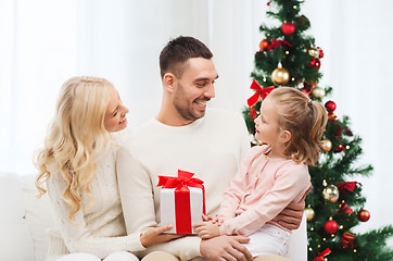 Image showing happy family at home with christmas tree