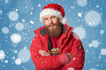 Image showing bright picture of handsome man in christmas hat.