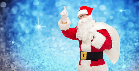 Image showing man in costume of santa claus with bag