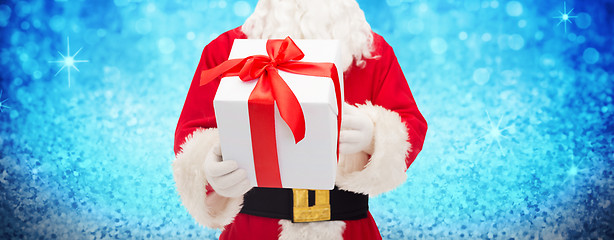 Image showing man in costume of santa claus with gift box