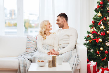 Image showing happy couple at home with christmas tree