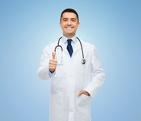 Image showing smiling doctor in white coat showing thumbs up