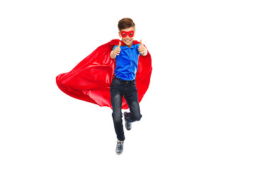 Image showing boy in super hero cape and mask showing thumbs up