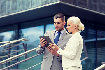 Image showing businesspeople with tablet pc outdoors