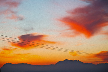 Image showing mountain in morocco africa   current cables     and red sunrise